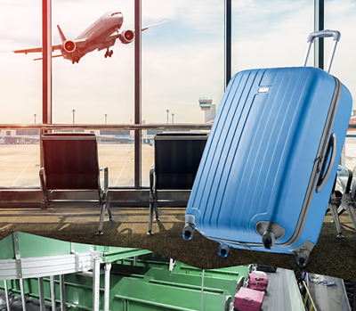 Personale che carica bagagli nella stiva di un aeromobile